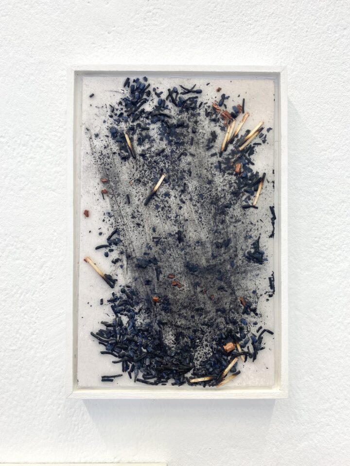 Nicht, es schwärzt. #13 / Not, it blackens. #13, 2024 Matches, ash, epoxy resin, wood 24 x 14 x 2,5 cm (inkl. Rahmen) Series: Feuer reinigt / Fire cleanses